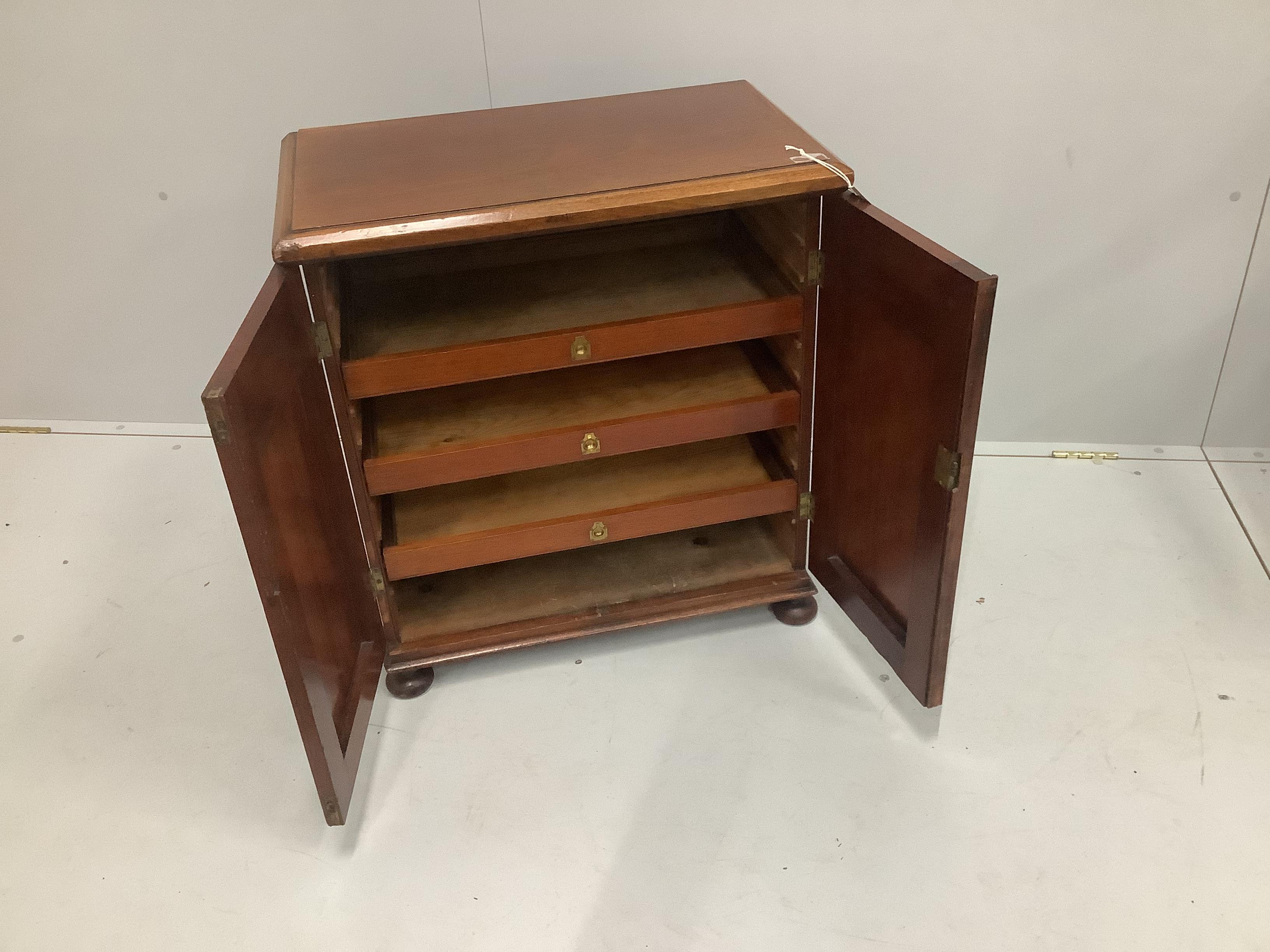 A Victorian mahogany collectors cabinet, now with three sliding internal drawers, (formerly with more), width 66cm, height 70cm